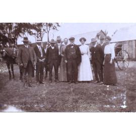 Unidentified group of people - nine men and three women