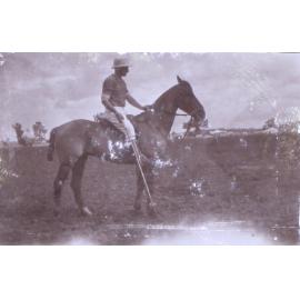 Unidentified polo player on horseback