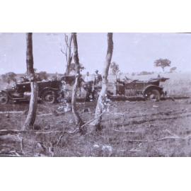 Two vehicles with unidentified man