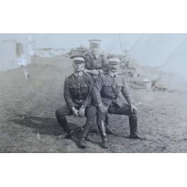 Three officers [Camp at Armidale Showgrounds]