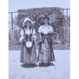 Two men dressed as women