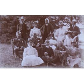 Group of seven men and six women in the garden