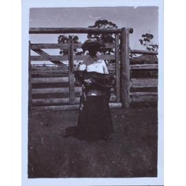 Woman with a foal in her arms