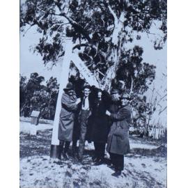 Group of men with the Metz sign, east of Armidale, NSW