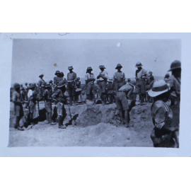 Soldiers digging in the desert