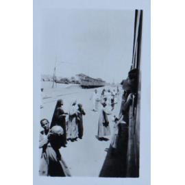 Locals at a train station