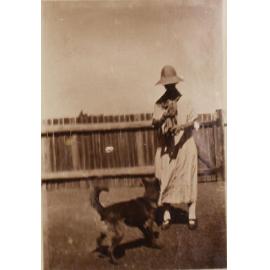 Unidentified woman and dog