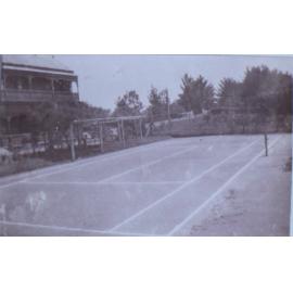 Tennis court and gardens at Saumarez