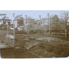 Gardens with homestead in the background