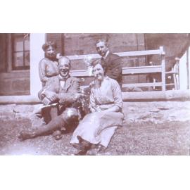 Two unidentified men and two women