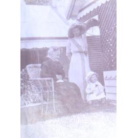 Two unidentified women and child