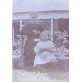 Unidentified woman and child