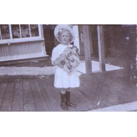 Unidentified child with a storybook