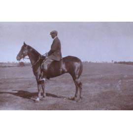 Unidentified man on horseback