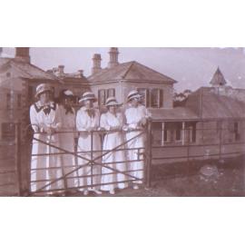 Five unidentified women in tennis attire