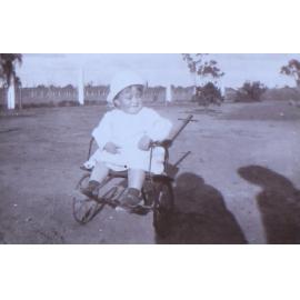 Unidentified child in a pram