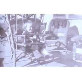 Unidentified child in a swing