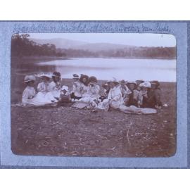 Unidentified group of women beside a lake