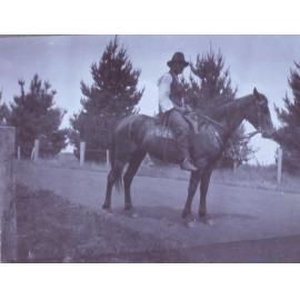 Unidentified man on horseback