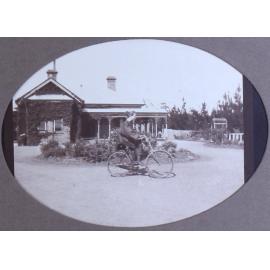 Unidentified woman on a bicycle