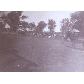 Outdoor scene - could be a race meeting[?]