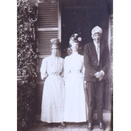 One unidentified man with two women