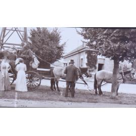Unidentified group with a four horse drawn wagon