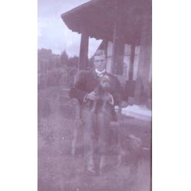 Unidentified man with pet dog