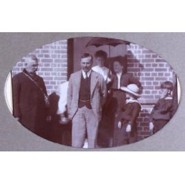 Unidentified group in front of a building