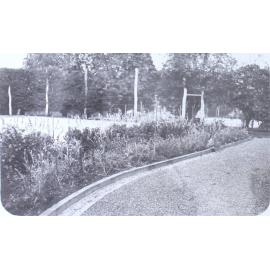 View of the gardens and the tennis court
