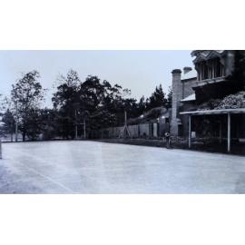 Tennis court and homestead