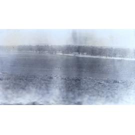 View of paddocks and flooded creek