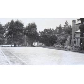 Tennis court, house and gardens at Saumarez