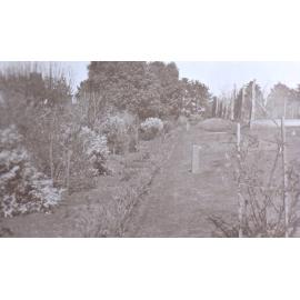 View of the gardens around the tennis court at Saumarez