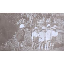 Group of five unidentified children in the garden