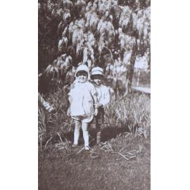 Two unidentified children in the garden