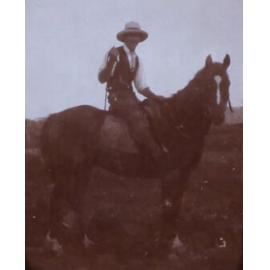 Man on horseback - D.Bell - caption
