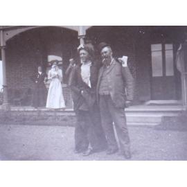 Unidentified group outside the homestead