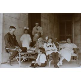 Unidentified group on a verandah