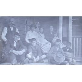 Unidentified group of men, women and children