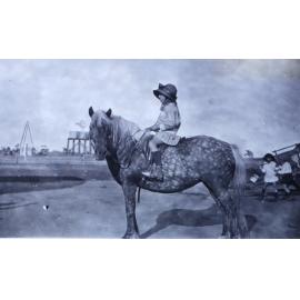 Unidentified young girl on a horse