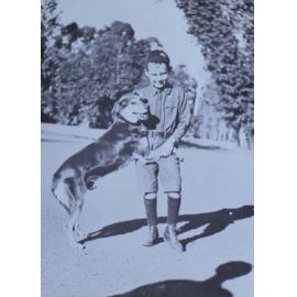 Young boy with a pet dog