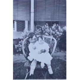 Young boy and a baby