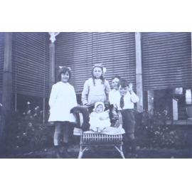 Young children with a baby