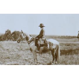 Unidentified woman on horseback