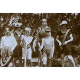 Women and children in swimming gear