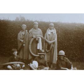 Three women and three children in swimming gear