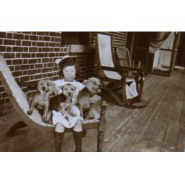 Young girl with pet dogs