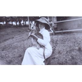 Woman holding a young kangaroo