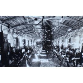 Interior of a decorated barrack with soldiers